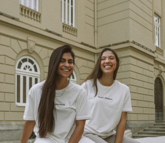 Mastering the Art of Minimalist Fashion young women in casual fashionable outfits posing in city