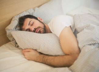 The Power of Sleep: Why Quality Rest Matters photo of sleeping man