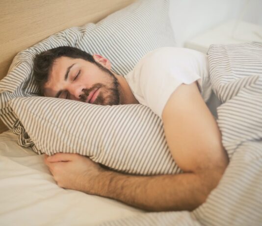 The Power of Sleep: Why Quality Rest Matters photo of sleeping man