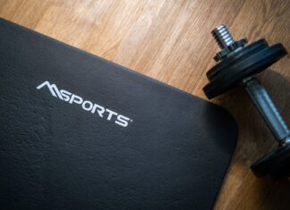 Home Workout Equipment Essentials photo of dumbbell near black mat