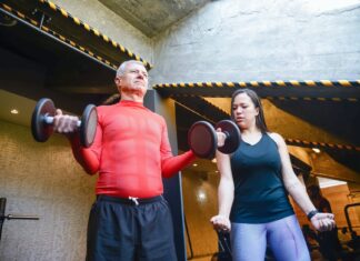 Senior-Friendly Home Workouts: Staying Active in Your Golden Years man lifting dumbbells beside a woman