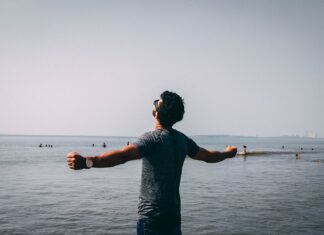 Alcohol-Free Living: The Benefits of Sobriety photo of man wearing gray shirt near sea