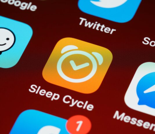 Evolving Role of Mobile Apps in Health and Wellness blue and white smartphone screen