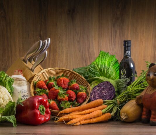 What Foods Can Lower Your Cancer Risk strawberries and vegetables on table