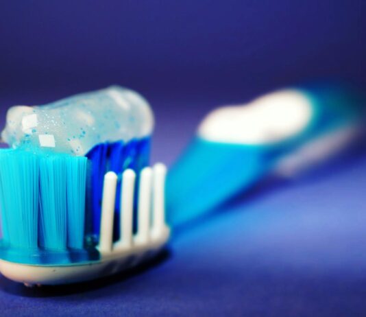 Can Too Much Fluoride Be Harmful? closeup and selective focus photography of toothbrush with toothpaste