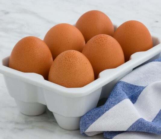 Eating More Eggs Might Help Protect Against Osteoporosis, Studies Shows six organic eggs on white tray