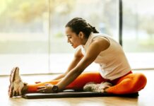 Stretching Isn’t Always the Answer for Pain and Muscle Tension woman stretching on ground