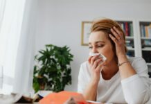 How Doctors Treat Their Own Seasonal Allergies: Neti Pots & Allergy Shots Revealed unhappy woman crying at home