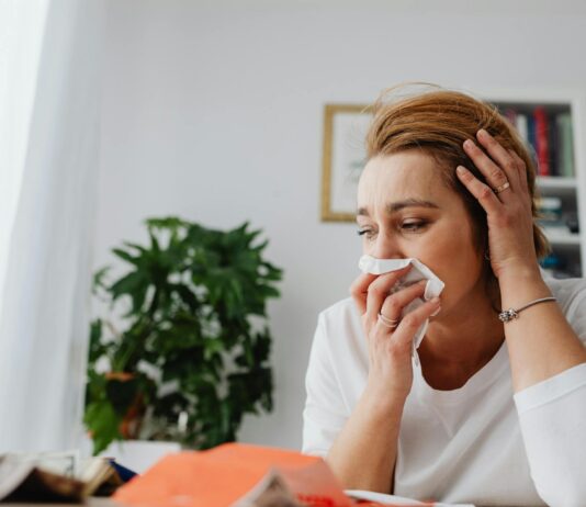 How Doctors Treat Their Own Seasonal Allergies: Neti Pots & Allergy Shots Revealed unhappy woman crying at home